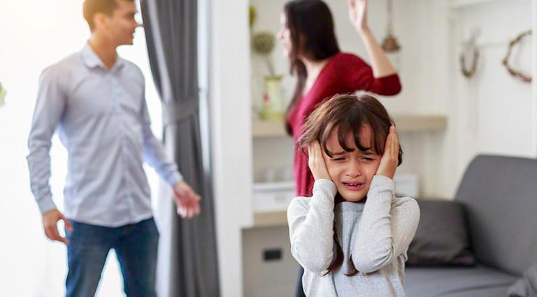 Crying girl with his fighting parents in the background, Sad gril while ...